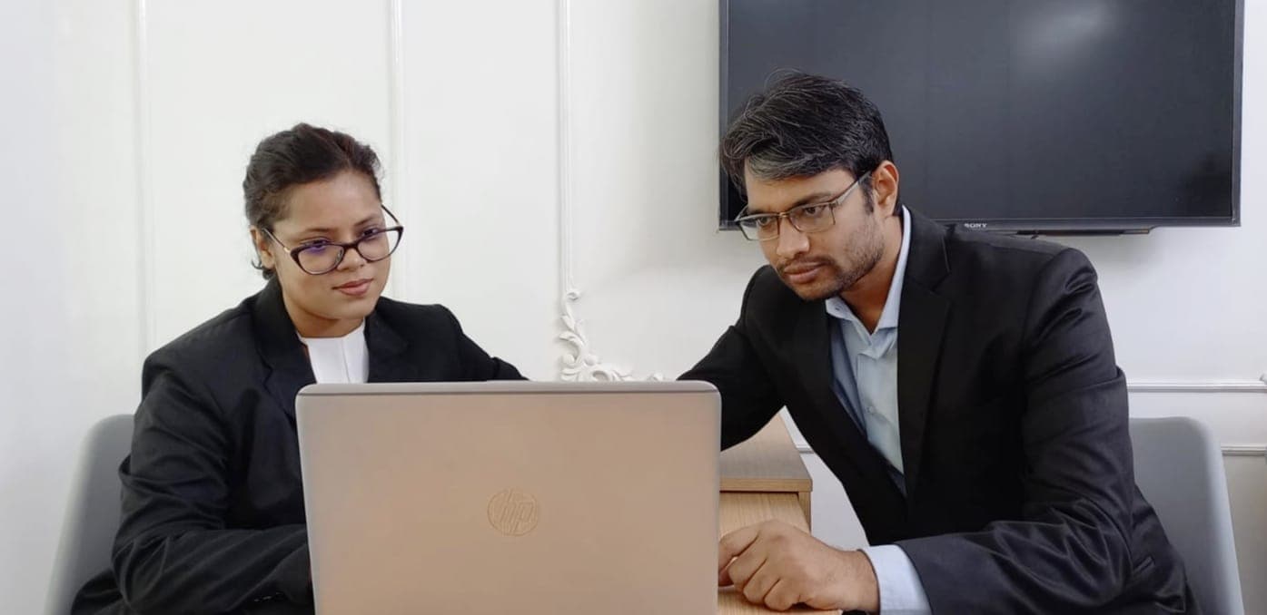 Multilegal Consultancy lawyers reviewing a case